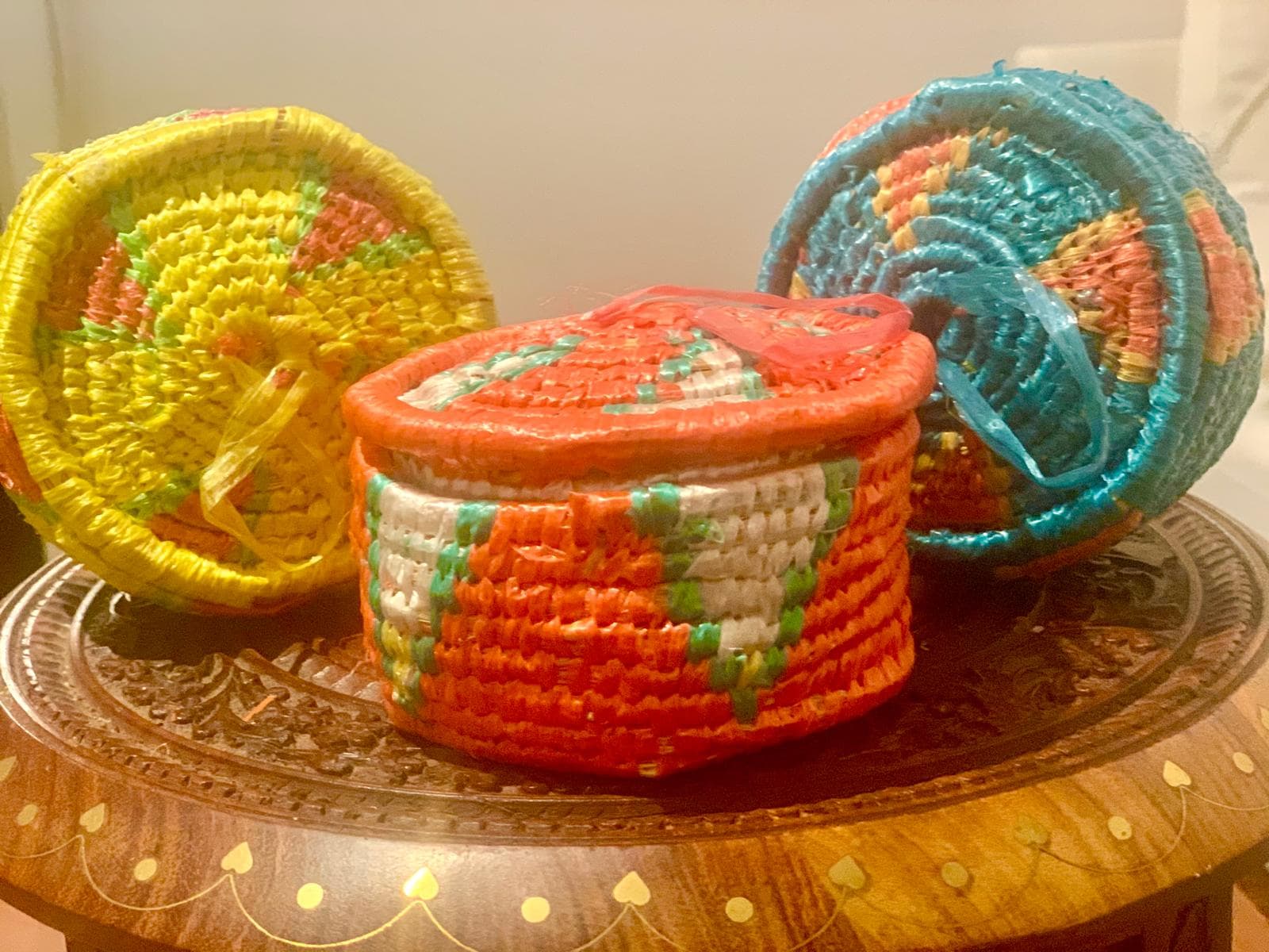 Woven baskets on an inlaid wooden table